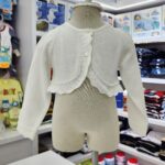 Torerita para niña de color blanco con botones tipo perla ideal para bautizo